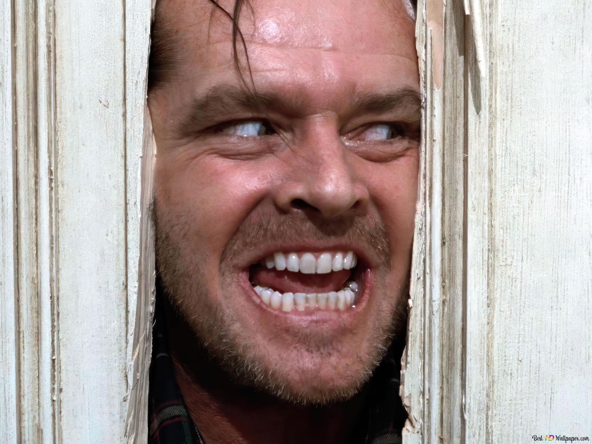 "А вот и Джонни!". Кадр из фильма «Сияние» (1980) режиссёра Стэнли Кубрика/ Фото: Warner Bros. Джек Николсон в роли Джека Торранса.